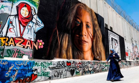 A mural on Israel’s ‘separation barrier’ in the West Bank city of Bethlehem, depicting Palestinian teenager Ahed Tamimi, imprisoned by Israel, and Palestinian paramedic Razan al-Najjar, who was shot dead by Israeli soldiers in Khan Yunis in the Gaza Strip