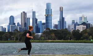 A person exercises at Albert Park in Melbourne.