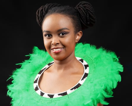 Valerie Keter in a costume with a green feathered neckline