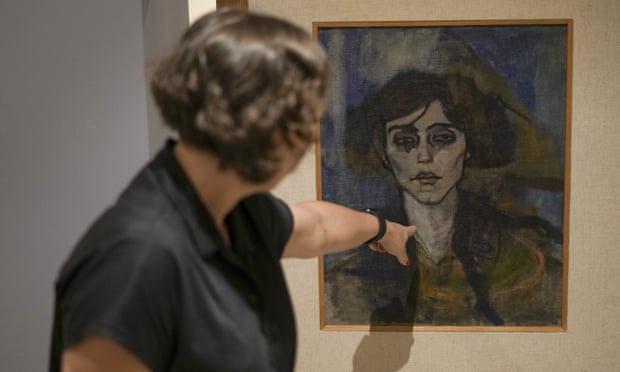 Inna Berkowits, at Haifa University’s Hecht museum in front of Modigliani’s Maud Abrantes, which is painted on the reverse side of a canvas with another painting titled Nude with a Hat