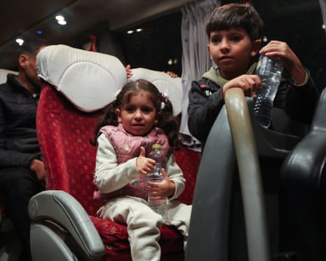 Palestinian patients ride in a bus before they are transferred for medical treatment abroad, amid a ceasefire between Israel and Hamas in Gaza, in Khan Younis, in the southern Gaza Strip, 22 October 2025.
