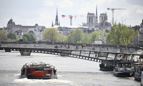 The Seine River, with Notre Dame cathedral in the background