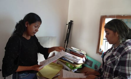 Kiara Moreno, wife of Rafael Moreno, on the left, and Maira Moreno, his younger sister, in Rafael Moreno’s home, five days after his murder.