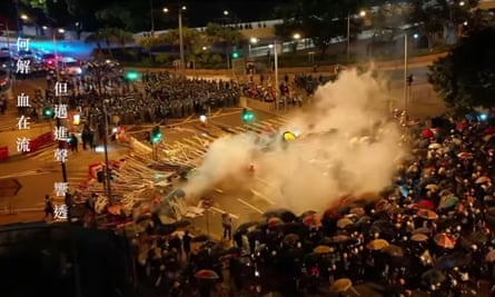 Pro-democracy protesters clash with authorities in the streets of Hong Kong, in images from the video.