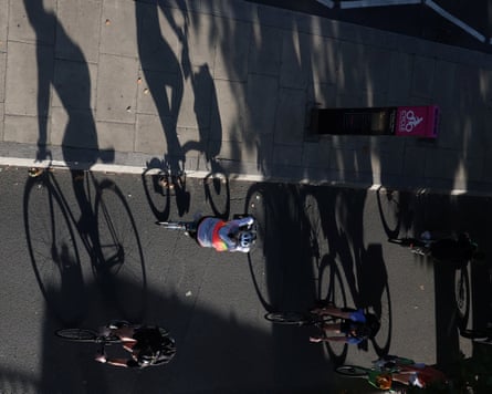 An overhead shot of people cycling in a cycle lane.