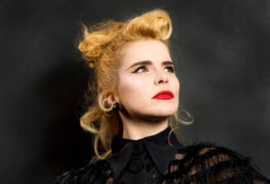 paloma faith poses in red lipstick for a headshot