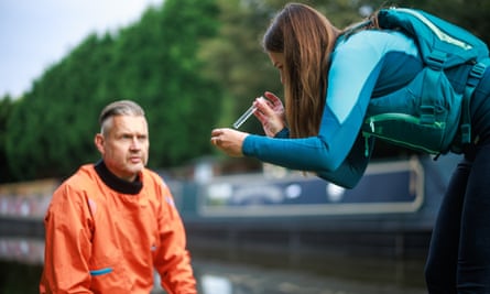 Carr testing water from the Trent and Mersey canal in Stone.