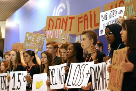 Climate activists take part in a protest during the Cop27 climate summit in Sharm el-Sheikh, Egypt, on 19 November 2022.