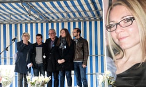 (Left to right) Isabelle Fouillot, Alexia Duval's mother, her husband Jonathann Duval, her father Jean-Pierre Fouillot, her sister Stephanie, and her stepbrother Gregory Gay stand next to a poster of Alexia in 2017.