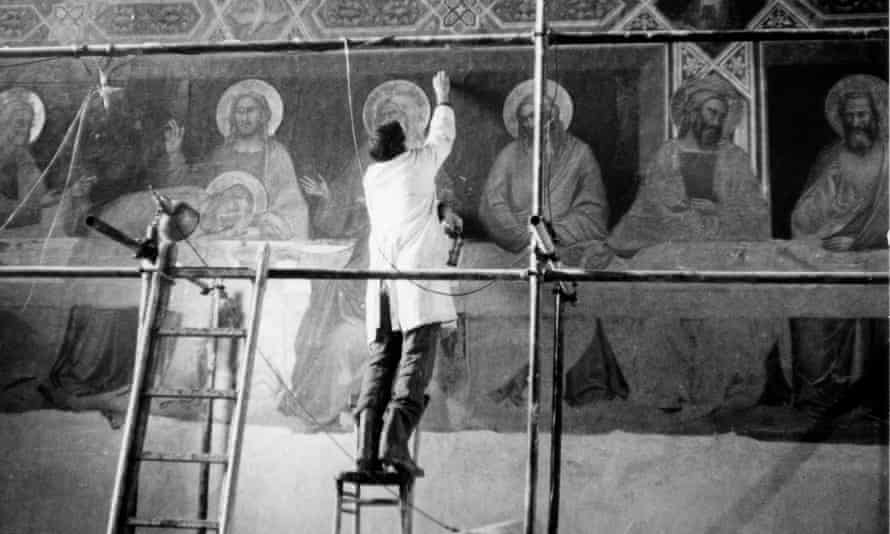 A restorer working on a fresco.