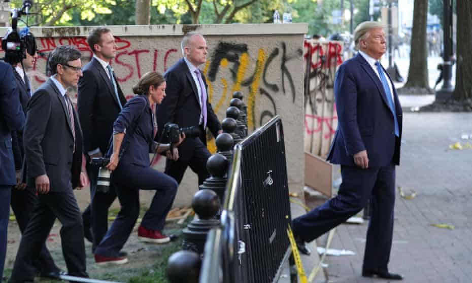 Trump walks to St John’s Church in Washington during the George Floyd protests in June 2020. Shealah Craighead is to the left.