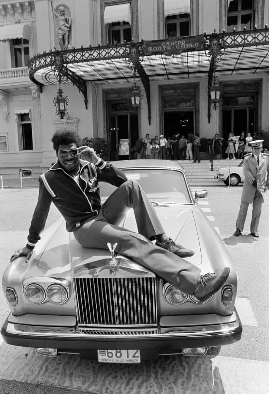 Spinks poses with a Rolls Royce in Monaco in 1979, a year after losing his title to Ali.