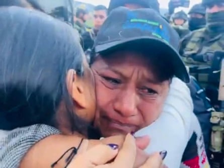 Aida Quilcué embracing another person