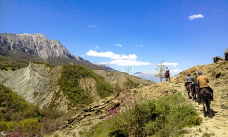 Horse riders on a mountain trail in Albania