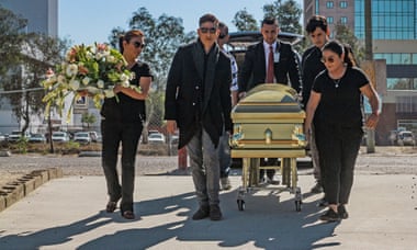 Relatives of Marbella Ibarra participate in her funeral in the city of Tijuana, Mexico, on Thursday.