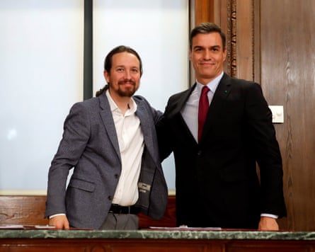 Podemos leader, Pablo Iglesias, and Pedro Sánchez, then acting prime minster, in 2019 after signing an agreement to form a coalition government.