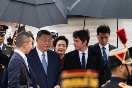 Xi Jinping is met by Gabriel Attal, the prime minister of France.