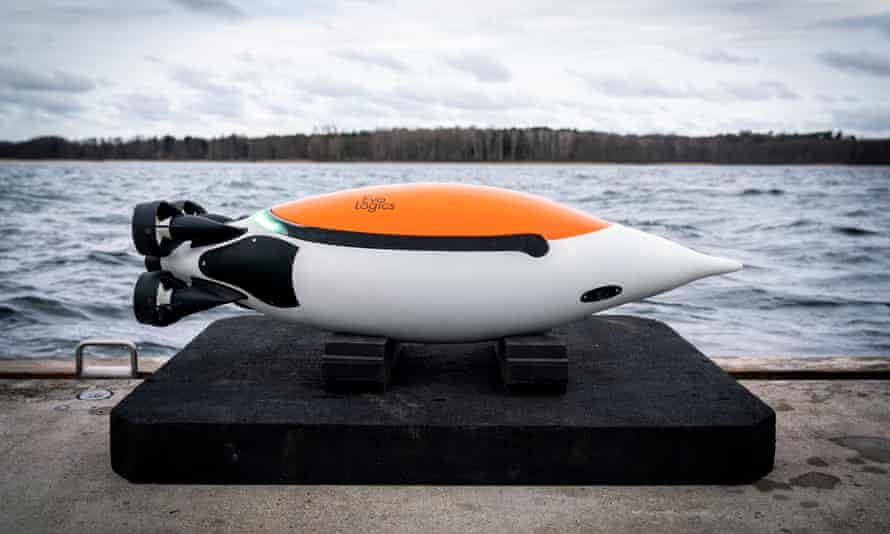 A prototype of the robot penguin, named Quadroin, on a quay