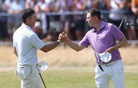 Rory McIlroy and Matt Fitzpatrick shingle hands connected nan 18th hole