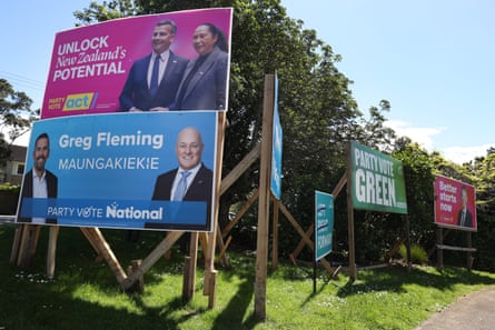 Election campaign billboards for various parties stand on grass in Maungakiekie