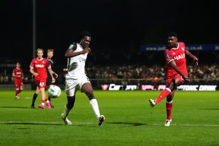 Ipswich Town's Ben Johnson levels the scores with a rebound strike.