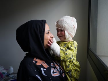 Ivana and Fatima, 2024This portrait of Ivana and her daughter Fatima was made two months after an Israeli-guided bomb hit the family’s home in Lebanon. Ivana and her sister suffered severe burns and were left homeless; the family have since been supported by the No More War foundation, established by photographer Giles Duley in 2017. Himself a triple amputee following injuries sustained in Afghanistan, Duley’s work documents the long-term impact of conflict on civilians. Despite incomprehensible suffering, a deep joy can be seen in the tender bond of mother and child