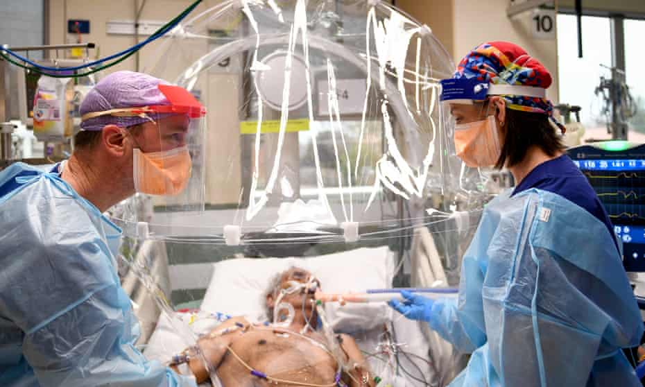 A Covid-19 patient being treated in intensive care. Australia’s health system is facing pressure from the spreading Omicron strain