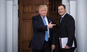 Donald Trump greets Kris Kobach, who is running for governor of Kansas.