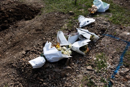 Bouquets on top of a patch of earth