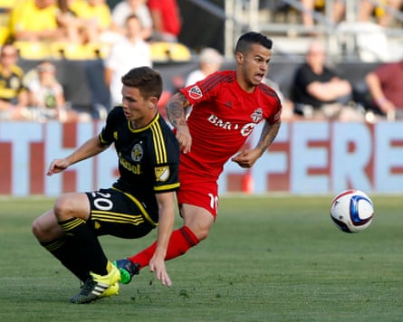 Toronto FC’s Sebastian Giovinco (right) beats Columbus Crew’s Wil Trapp during a 3-3 draw in 2015.