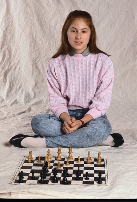 Judit Polgár aged 12 sits cross-legged with a chess board
