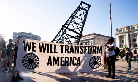 Climate activists march outside the White House to protest against fossil fuel use and to urge Joe Biden to prioritize clean energy climate policy.