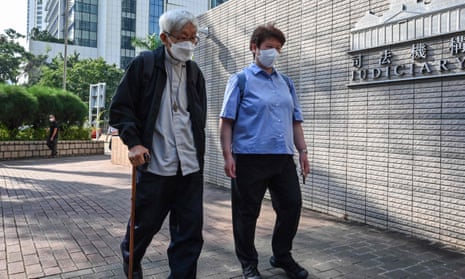 Cardinal Joseph Zen (left) arrives at a Hong Kong court on Monday for his trial.