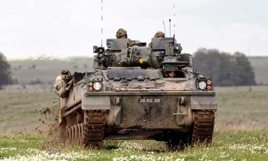A British Army Warrior infantry fighting vehicle, MCV-80, on the Salisbury Plain military training area