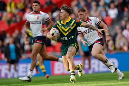 Reece Walsh runs with the ball.