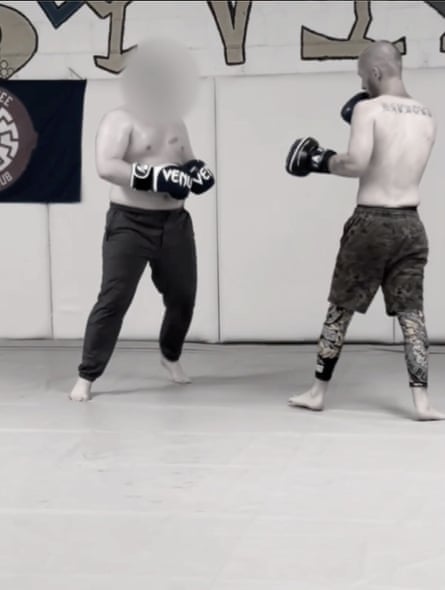 two men in a fighting stance