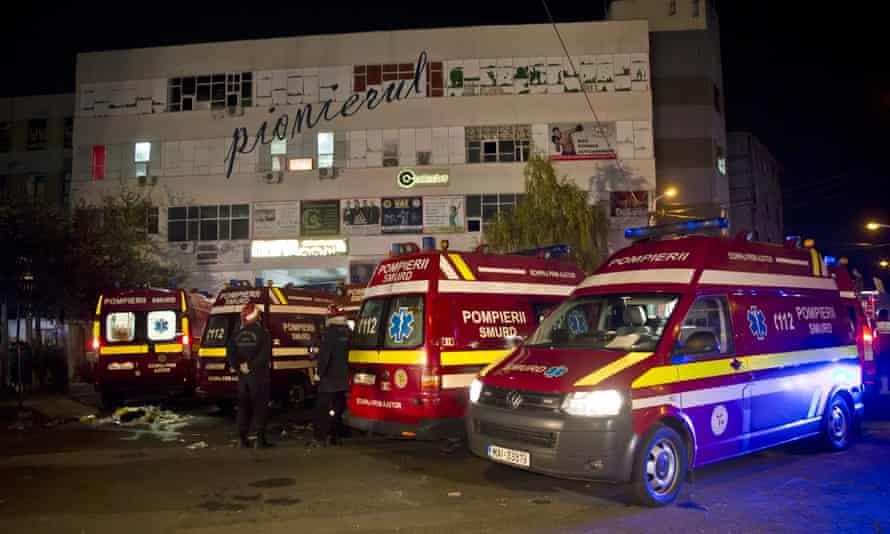 Emergency services outside the Colectiv nightclub after the fire and explosion.