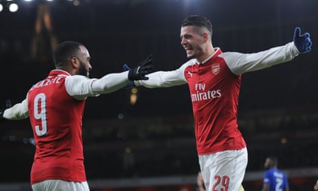 Granit Xhaka (right) celebrates scoring Arsenal’s second goal against Chelsea in the Carabao Cup semi-final second leg.
