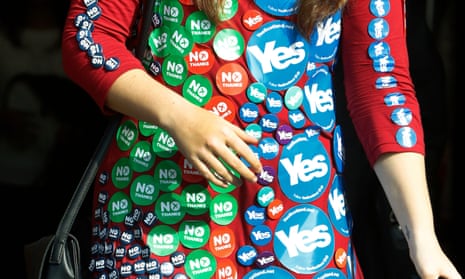 Reporter wearing badges during the Scottish independence referendum in 2014