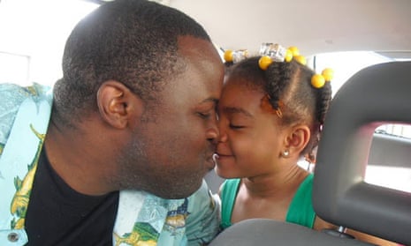 Chinedu Okobi with his daughter. Okobi died after being tased by officers this month.