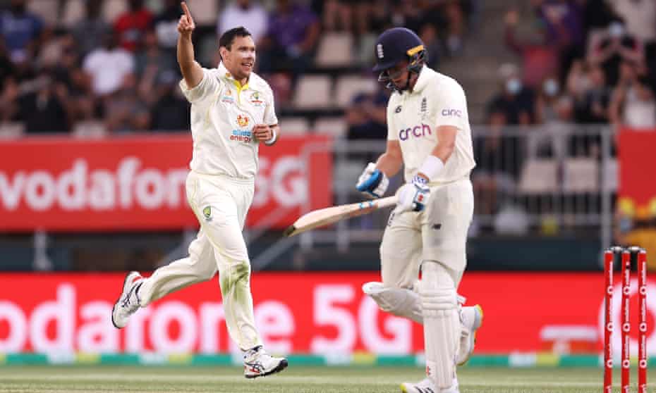 Australia’s Scott Boland celebrates taking the wicket of Ollie Pope.