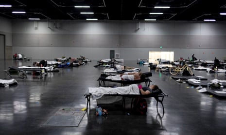 People sleep at a cooling shelter set up during an unprecedented heatwave in Portland, Oregon, 27 June.
