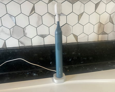 Suri 2 toothbrush charging on its stand