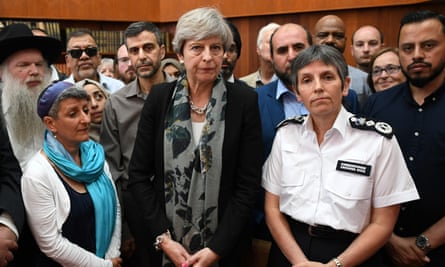 Theresa May and the Metropolitan police commissioner, Cressida Dick, talk to faith leaders at Finsbury Park mosque on 19 June