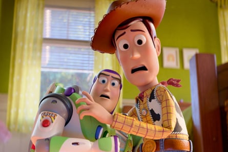 Buzz Lightyear, voiced by Tim Allen (left), and Woody, voiced by Tom Hanks, in a scene from Toy Story 5.