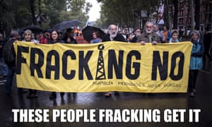 Concerned citizens hold a banner against fracking during a demonstration in Madrid, Spain.