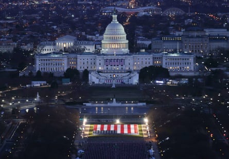 The US Capitol Building is prepared for the inauguration ceremonies for President-elect Joe Biden as the “Field of Flags” are placed on the ground on the National Mall on January 18, 2021 in Washington, DC.