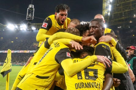 Dortmund’s players celebrate during the 4-2 home win against Bochum.