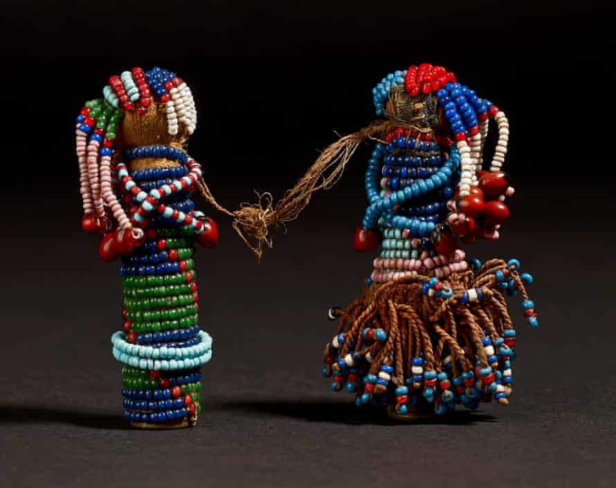 A pair of late 19th-century Sotho gun cartridge dolls.