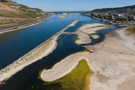 The exposed riverbanks of the Rhine in Bingen, Germany. The Rhine is experiencing record-low water levels amid a severe drought.